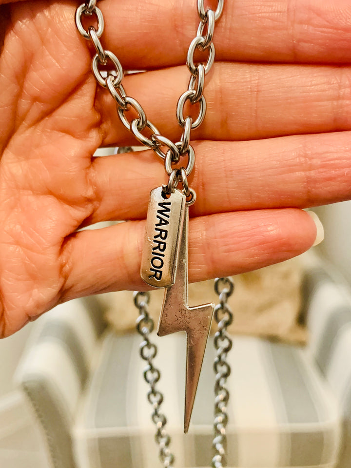 Spark of Resilience - The Warrior's Necklace