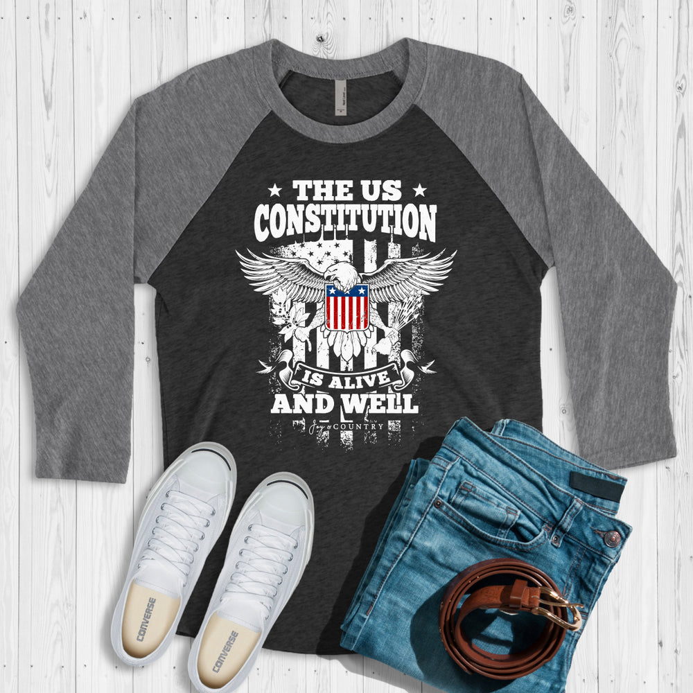 The US Constitution is Alive and Well - Unisex Tri-Blend 3/4 Sleeve Raglan Tee - Joy & Country