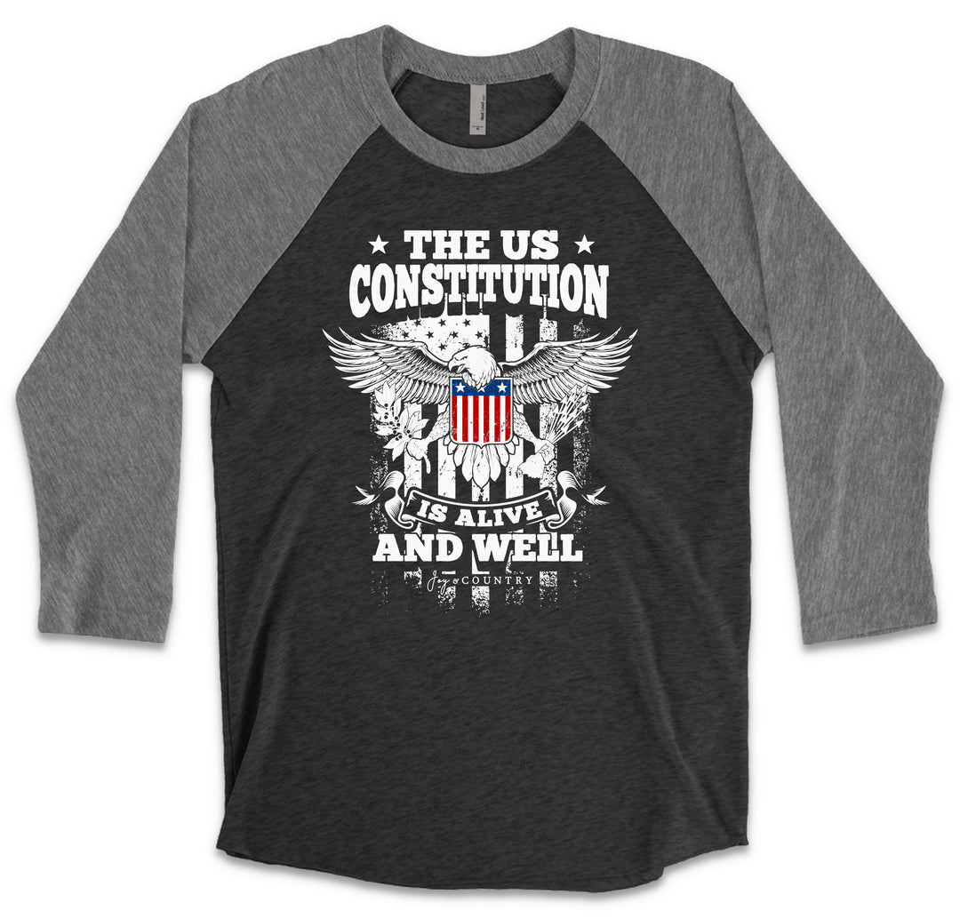 The US Constitution is Alive and Well - Unisex Tri-Blend 3/4 Sleeve Raglan Tee - Joy & Country